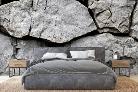 Grijze steenlook met scheuren en diepte