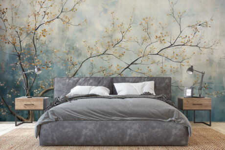 Gouden bladeren op blauwe muur